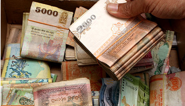 Sri Lankan Rupee Marginally Higher on Banks’ Dollar Sales