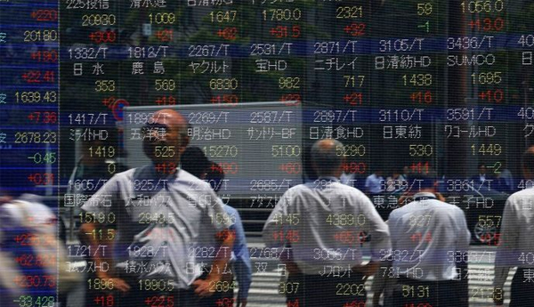 Asian stocks track Wall St rally after US data