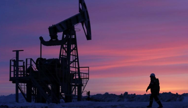 Oil hits two-year high on Saudi purge, world shares retreat