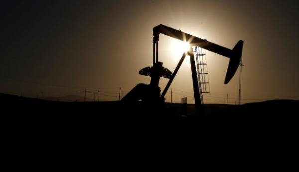 Oil Edges Up On Falling U.S. Crude Stocks, But Global Glut Weighs
