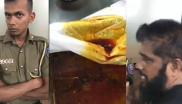 Worm in Chicken Curry Law Enforcing Policemen Looked at it Curiously