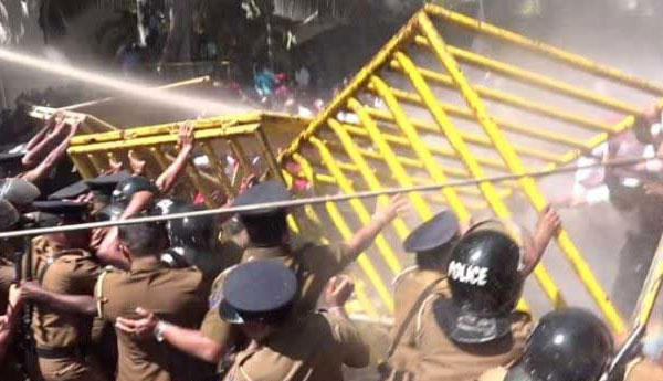 Riot Police Used High-Pressure Water Cannons to Disperse Unemployed Graduates
