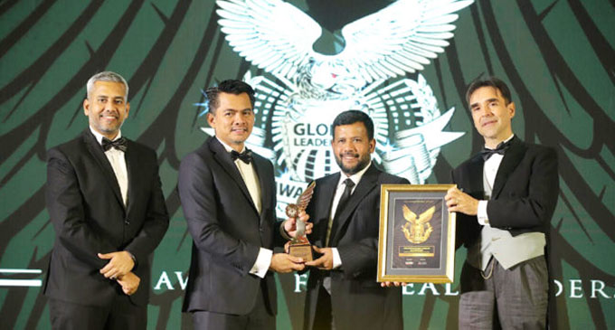 Minister Rishad Bathiudeen wins Global Leadership Award in Malaysia