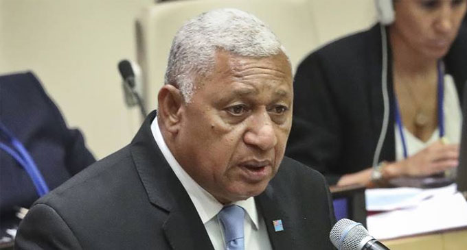 Fiji leader sworn in for 4 more years after winning election