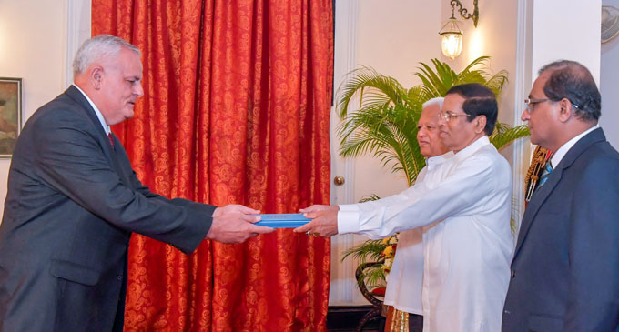 Four new Envoys present credentials to President