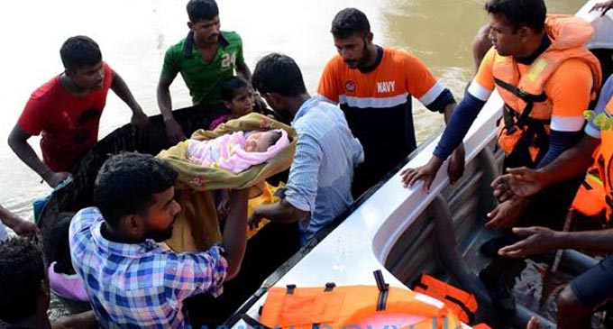 Navy relief teams engaged in flood relief operations Navy relief teams engaged in flood relief operations