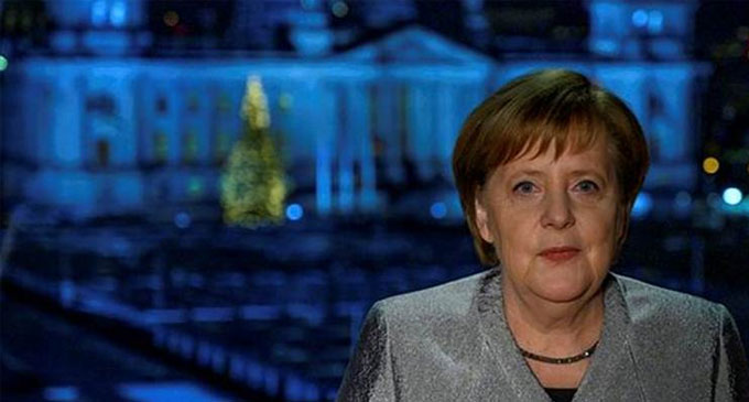 Merkel urges divided Germans to pull together in 2019 Merkel urges divided Germans to pull together in 2019