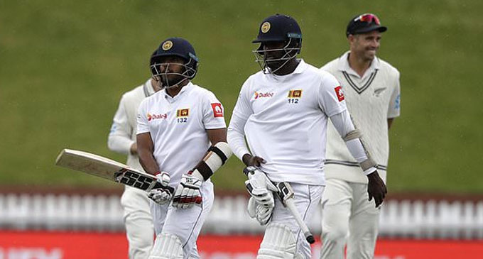 Sri Lanka battle to rain-hit draw in New Zealand first Test Sri Lanka battle to rain-hit draw in New Zealand first Test