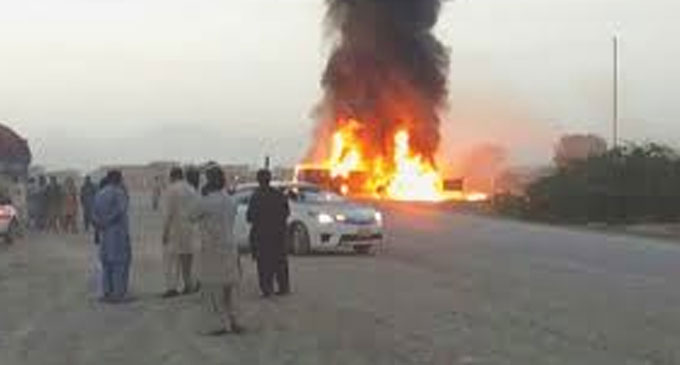 27 killed in Pakistan as bus bursts into flames after crash with truck