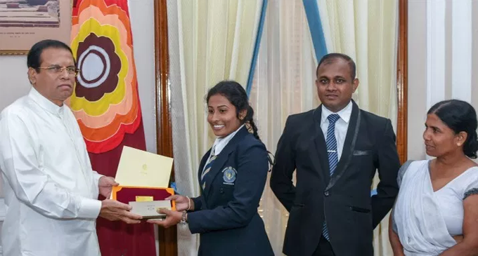 President made a cash donation to student, who is ranked first in Polonnaruwa district at G.C.E. (A/L) Examination President made a cash donation to student, who is ranked first in Polonnaruwa district at G.C.E. (A/L) Examination