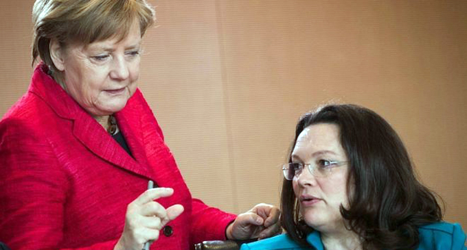 Merkel vows to carry on despite coalition setback