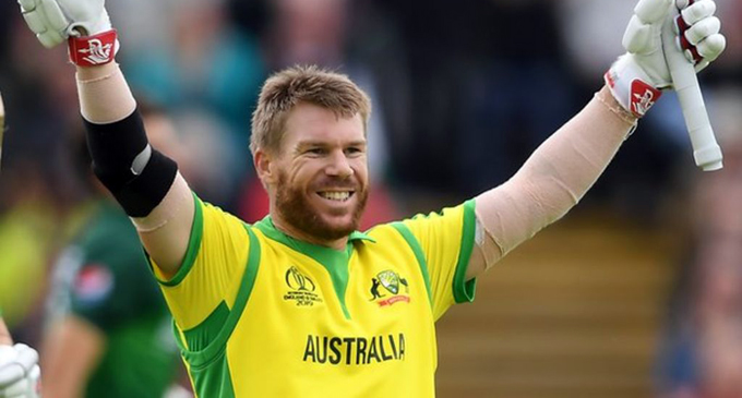 Warner’s century leads Australia to victory over spirited Pakistan