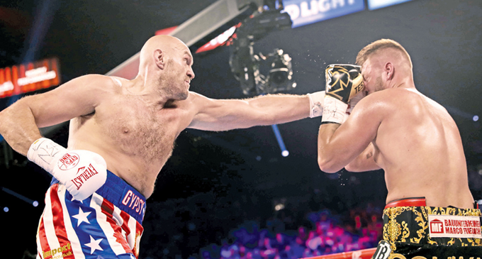 Fury batters Schwarz with second round knockout