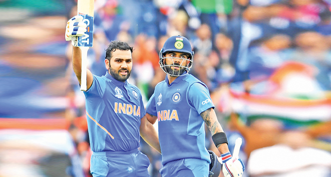 Ton-up Sharma stars as India beat rivals Pakistan