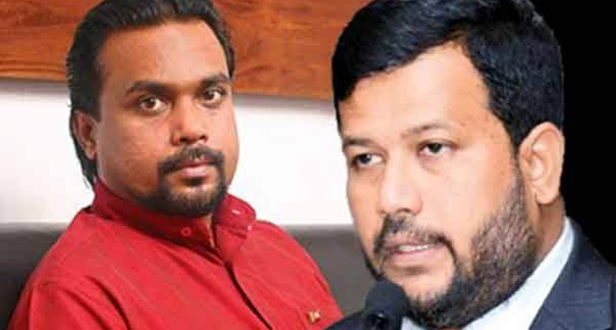 Rishad demands compensation from Wimal