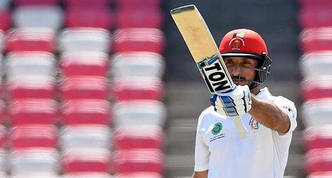 Shah steers Afghanistan with historic ton Shah steers Afghanistan with historic ton