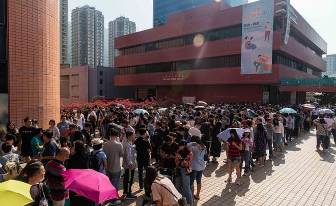 Hong Kong elections: Record numbers vote in district council polls