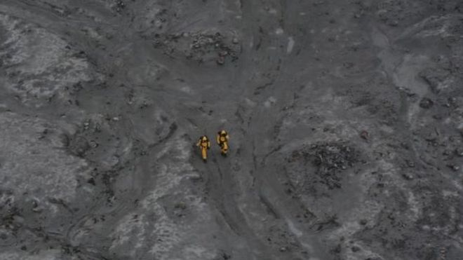 Divers deployed around volcano as 6 bodies found