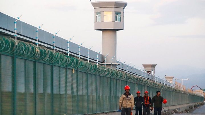 China Uighurs: Detainees ‘free’ after ‘graduating’, official says