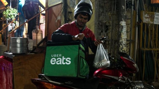 Uber sells its India food delivery business to Zomato