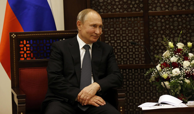 Putin calls for summit on Libya