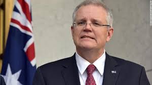 Australia PM extends travel ban on foreigners from China