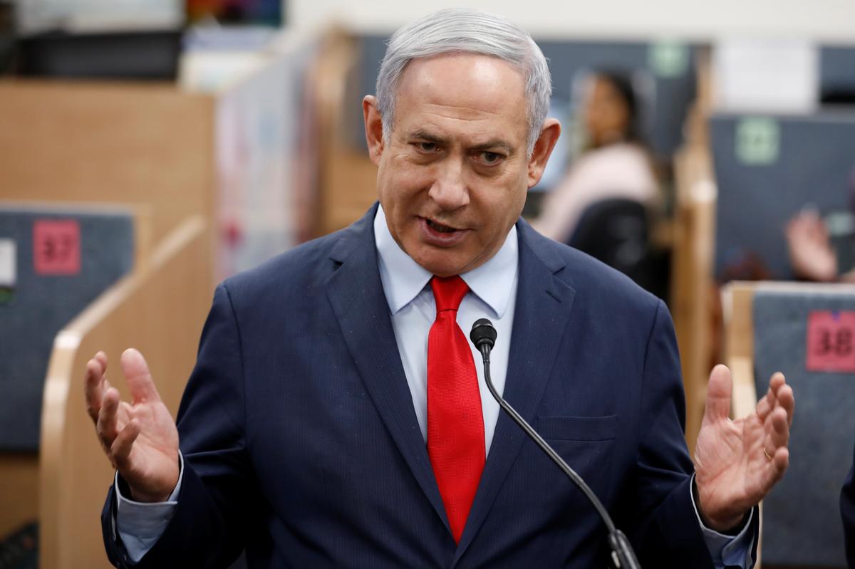 Israel election: Netanyahu claims victory after exit polls show narrow lead