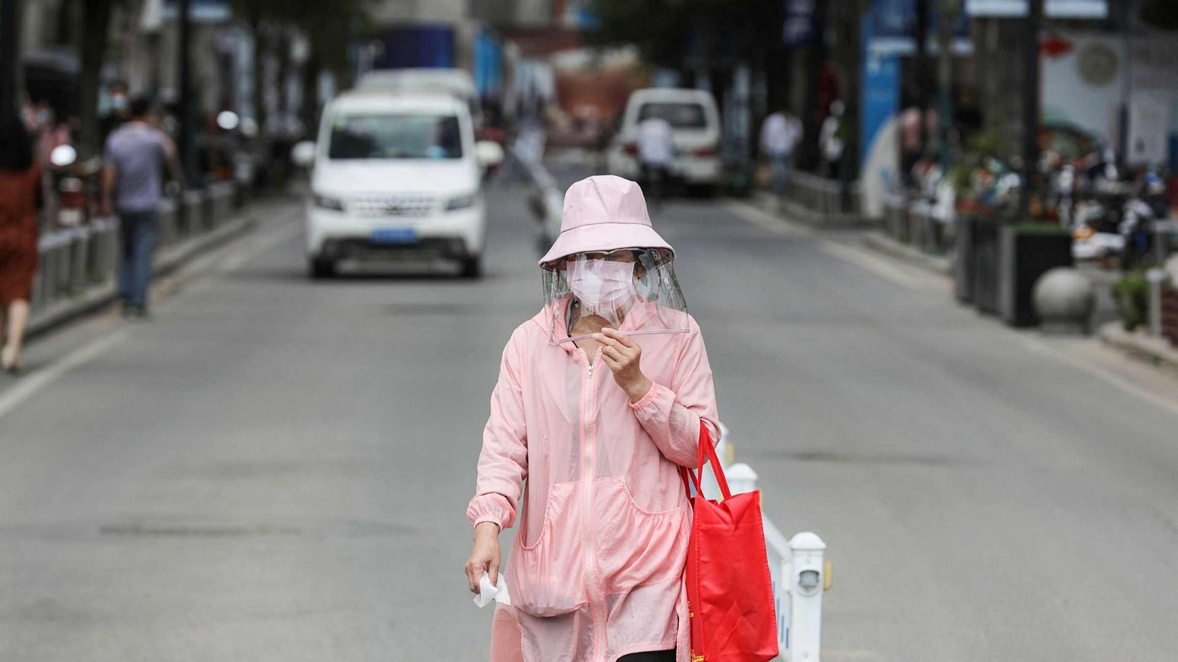 China infections rise as new city cluster emerges