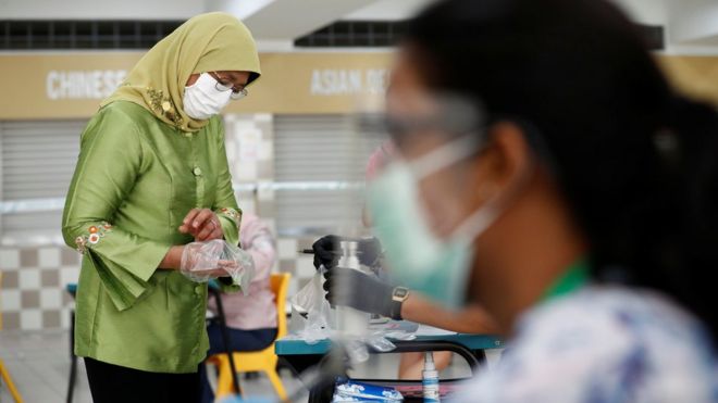 Singapore ruling PAP party wins elections, but support falls