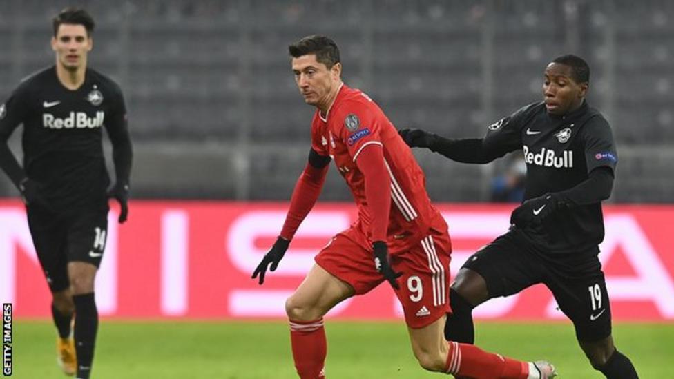 Lewandowski helps Bayern into last 16 Lewandowski helps Bayern into last 16