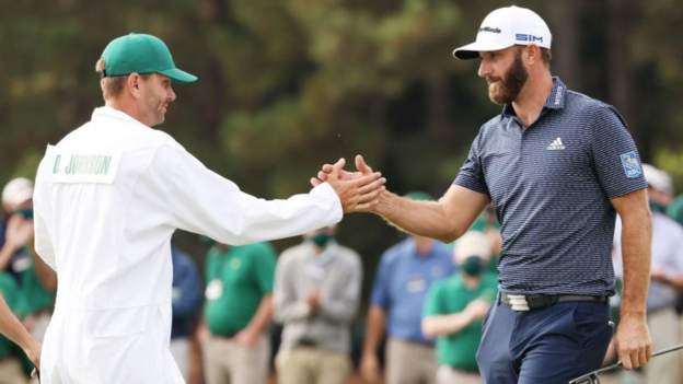 Record-breaking Johnson wins first Masters Record-breaking Johnson wins first Masters