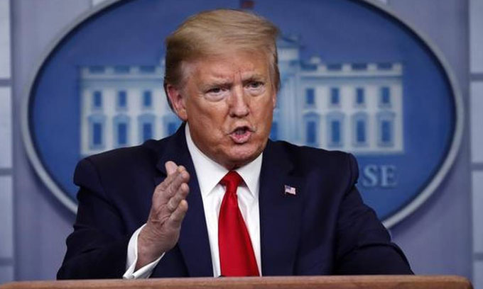 Trump signs massive USD 900 billion COVID relief bill
