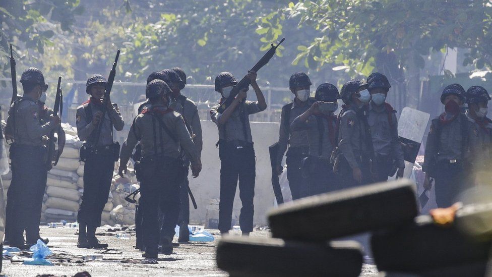 Myanmar protesters flee after being trapped