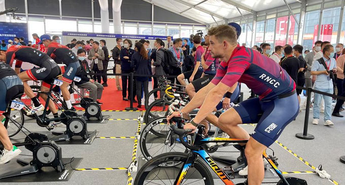 Riders on their bikes for online competition