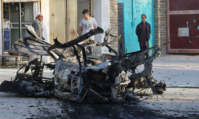 Car bomb at guest house kills 30 in Afghanistan