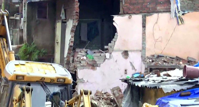 Eleven dead in India building collapse