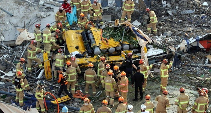 Nine die as building collapses on bus in South Korea