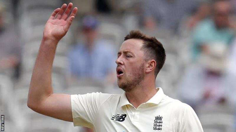 England bowler Ollie Robinson suspended for eight matches for past racist and sexist tweets England bowler Ollie Robinson suspended for eight matches for past racist and sexist tweets