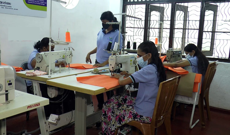Blind women weave threads of hope in a garment factory