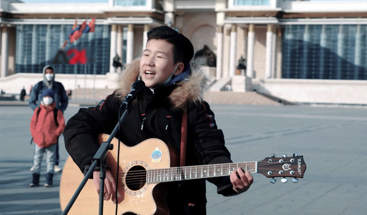 D. Enkhtaivan fulfills dreams of avid singers through “Open Mic Mongolia”