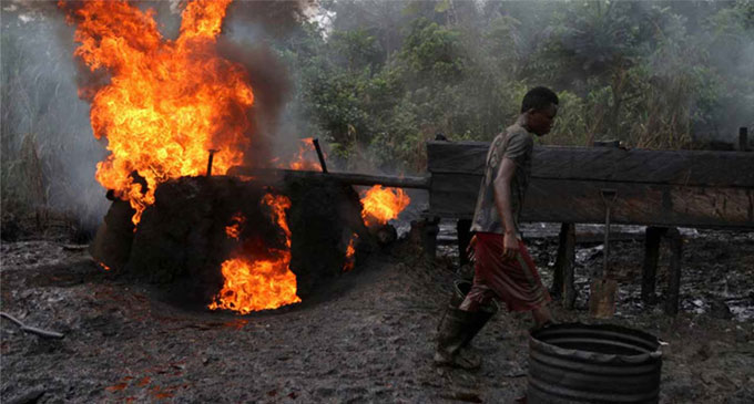 Hundred killed after blast at illegal Nigerian oil refinery