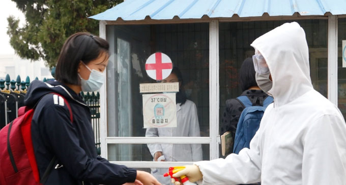 North Korea reports first COVID outbreak since pandemic began