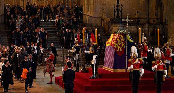 Public mourners wait in hours-long queue to view Queen Elizabeth’s coffin