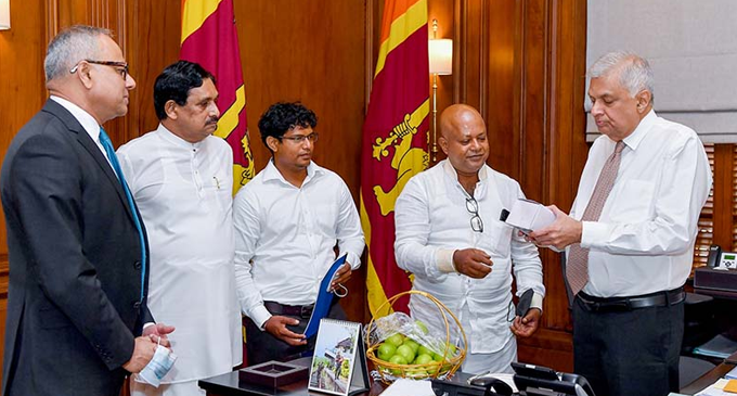 President presented the maiden apple harvest produced in Sri Lanka